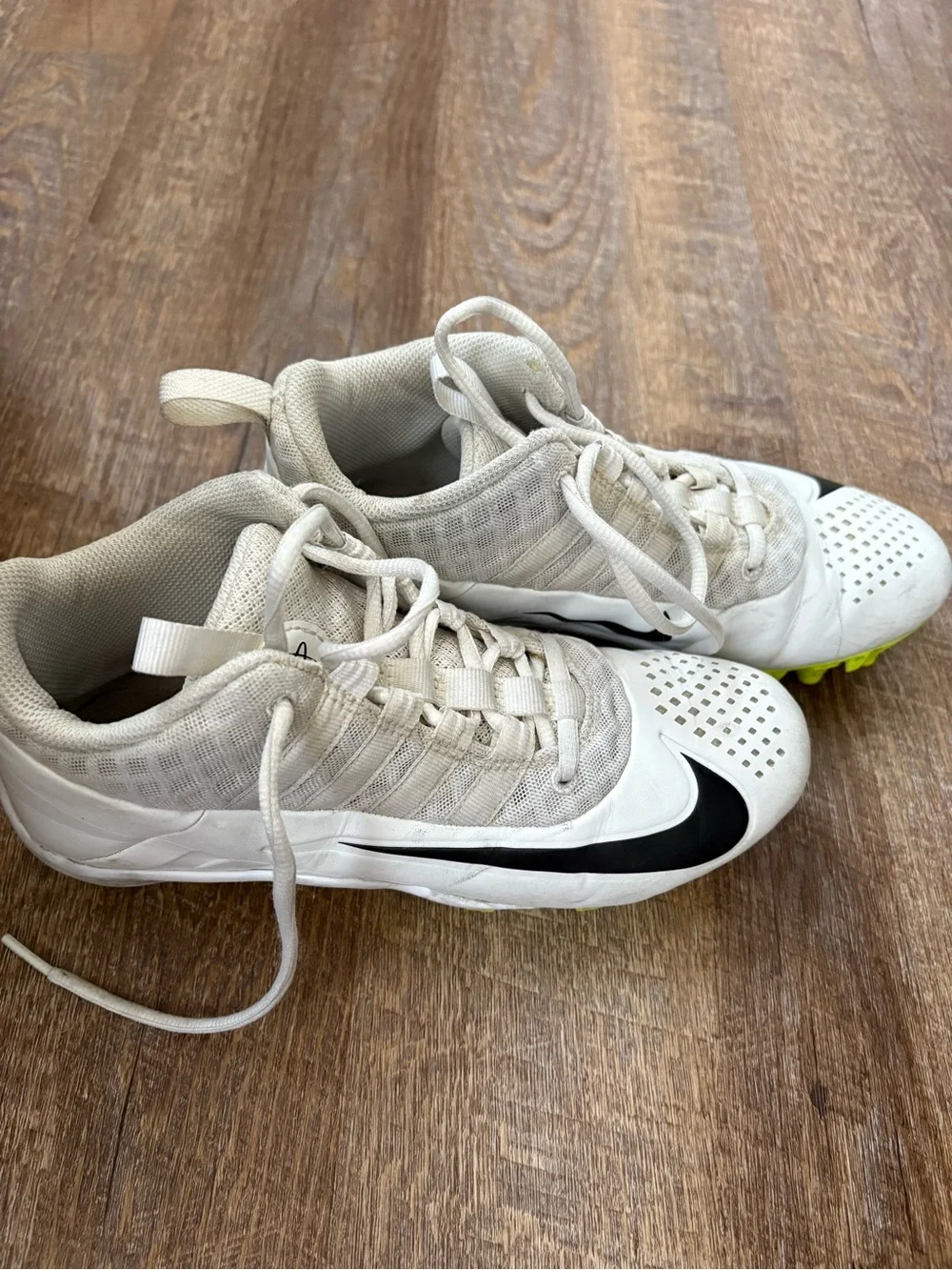 Nike Kids White and Black Athletic Cleats (no metal points)